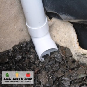We used a piece of 40mm pipe and an elbow connector for the watering pipe